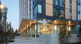 The CLT canopy demonstrates the use of mass timber in the building and provides rain coverage for pedestrians.
